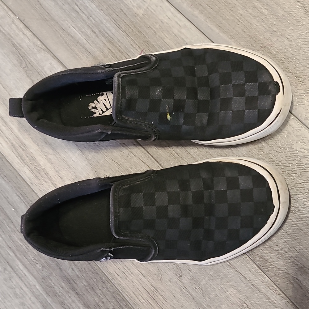 Black checkered slip on Van's size 1 kids unisex